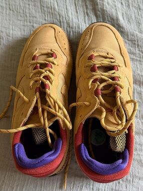 Nike Yellow Sneakers with Red and Purple Accents